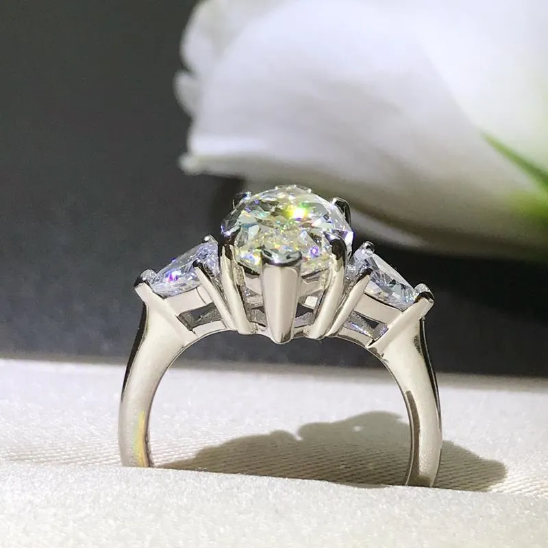 Light Yellow Three Stone Tapered Marquise Ring